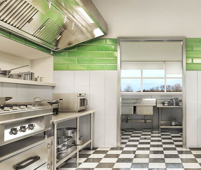 Cocción industrial con placas de cocina en cocina moderna